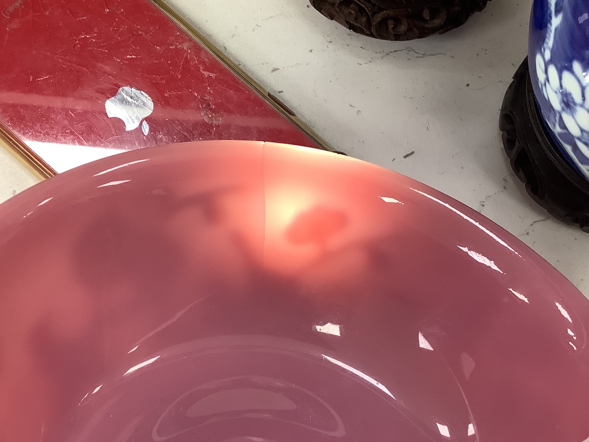 A Chinese Beijing pink glass bowl - cracked